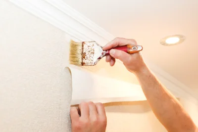 Pose de papier peint au Ménil — revêtements muraux et toiles de verre